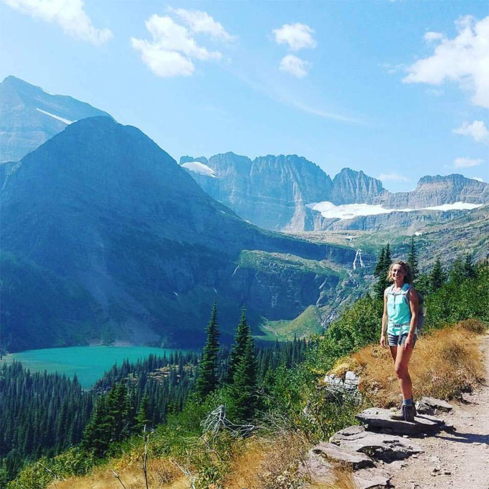 Dr. Kasey Holland outdoors promoting functional medicine and natural healing.